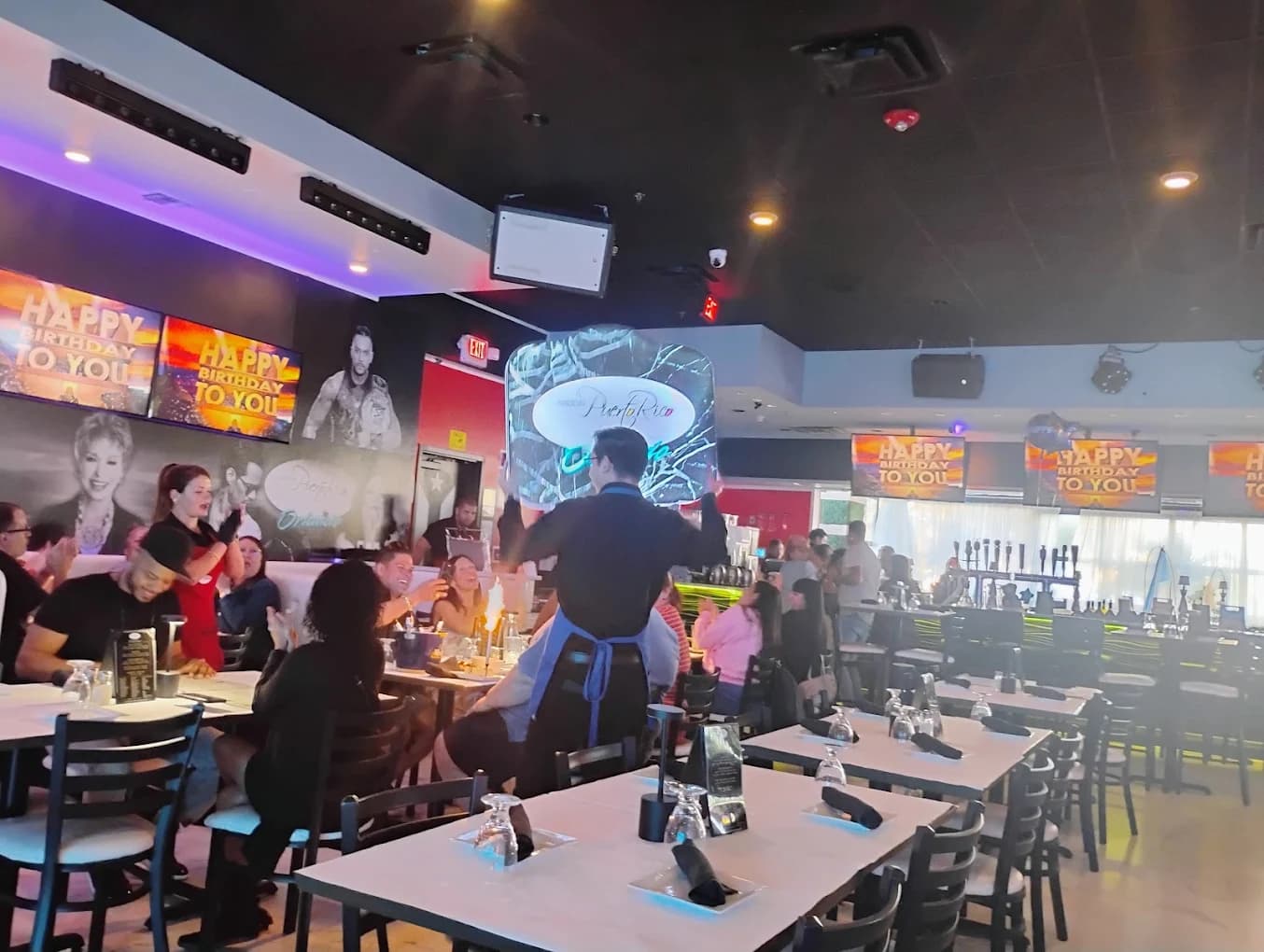 Guests dining during a celebration at Made in Puerto Rico Orlando